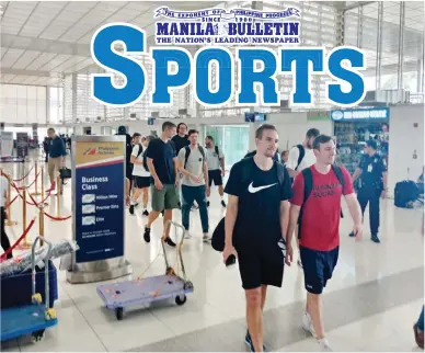  ??  ?? Members of the Australian national team make their way to the departure area of the NAIA Terminal 2 Centennial Airport yesterday hours after a tumultuous game againt Gilas Pilipinas in the FIBA World Cup Asian Qualifiers at the Philippine Arena in Bocaue, Bulacan. (Ariel Fernandez)