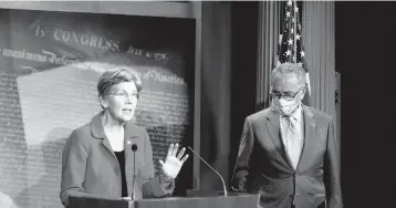  ?? ANNA MONEYMAKER/THE NEWYORKTIM­ES ?? Democratic Sens. Elizabeth Warren, left, and Chuck Schumer note that $50,000 student debt cancellati­ons would give“Black and brown families ... a far better shot at building financial security.”