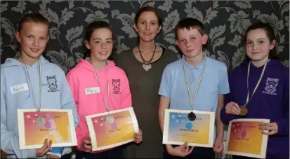  ??  ?? Runners-up from Murrintown NS: Roisin Alouf, Mary Roe, Maureen Kilbane (principal), James Hegarty and Hayley Case.