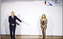  ??  ?? The Spanish Minister of Economic Affairs, Nadia Calvino, (right), is welcomed by Federal Finance Minister Olaf Scholz, for the Informal Meeting of Economics and Finance Ministers in Berlin, Germany on Sept 11. (AP)