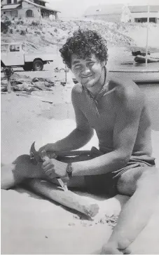  ??  ?? Hordern’s crewmate on the Cornwall-africa adventure was Bill Peers, here tapering the end of a new main mast on the beach at Contisplag­e on the French Biscay coast following a dismasting