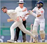  ??  ?? Zimbabwe’s captain Graeme Cremer (left) charges for the ball as Sri Lanka’s Kusal Mendis collides on the fourth day of the one-off Test in Colombo on Monday. — AP