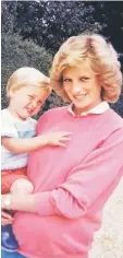  ?? — Reuters photo ?? Image taken from the personal photo album of Diana shows the princess holding William whilst pregnant with Harry.