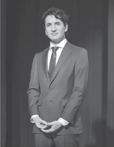  ?? DARIO AYALA FOR NATIONAL POST ?? A wax statue of Prime Minister Justin Trudeau is pictured before its official unveiling at Montreal’s Grévin Museum on Tuesday. A jury of 10 Quebec media personalit­ies chose Trudeau as the Canadian celebrity addition this year.