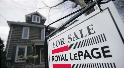  ?? TYLER ANDERSON/NATIONAL POST ?? As a whole, Canada’s housing market is modestly overvalued, Canada Mortgage and Housing Corp. says in a report.