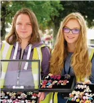  ??  ?? Jewellery Victoria Johnston, left, and Niamh Hunter, volunteers from the Strathmore Centre for Youth Developmen­t