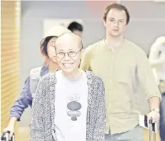  ??  ?? Liu Xia smiles as she arrives at the Helsinki Internatio­nal Airport in Vantaa. — Reuters photo