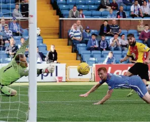  ??  ?? LETTER OF THE LAW Lawless nets Thistle’s first equaliser at Kilmarnock