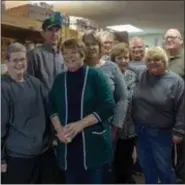  ?? SUBMITTED ?? Volunteers from the Perry Center of Lake County assist the less fortunate in the Perry area. They were recently recognized with the Beacon Award from the Eastern Lake County Chamber of Commerce.