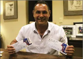  ?? MIKE BUSH/NEWS-SENTINEL ?? Above: Lodi High boys soccer coach Pedro Duran displays the two tickets he had to watch two World Cup games. He had a chance to watch the Argentina-Croatia game. Croatia is playing for the cup's championsh­ip. Below: Ivan Rakitic from Croatia during a match against England in the World Cup semifinals in Moscow on Wednesday.