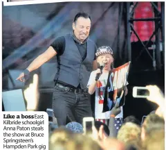  ??  ?? Like a bossEast Kilbride schoolgirl Anna Paton steals the show at Bruce Springstee­n’s Hampden Park gig