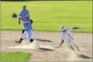  ?? SARAH PIETROWSKI - FOR DIGITAL FIRST MEDIA ?? Governor Mifflin’s Trevor Woolwine (7) slides into second base, trying to avoid the tag by Daniel Boone’s Ty Esenwein (29) while Joey Moyer (7) looks on during Governor Mifflin’s 1-0 win Wednesday.