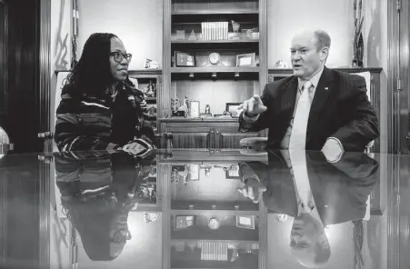  ?? Alex Brandon / Associated Press ?? Judge Ketanji Brown Jackson meets with Sen. Chris Coons, D-Del., on Thursday. Her Senate confirmati­on hearing begins March 21.