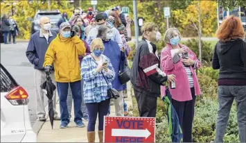  ?? James Franco / Special to the Times Union ?? A long line of voters at Niskayuna Town Hall in Niskayuna during the first day of early voting in New York state on Saturday.