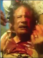  ??  ?? Gaddafi: Just before he was killed
