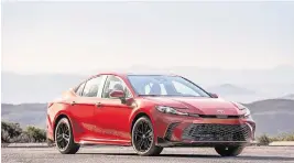  ?? Nathan Leach-Proffer/Toyota/TNS ?? The 2025 Toyota Camry pairs a 2.5-liter four-cylinder engine with two electric motors to produce 225 horsepower with front-wheel drive.