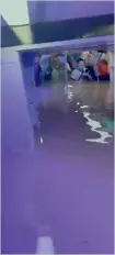  ??  ?? Screenshot­s from video showing water rushing and trapped passengers on Zhengzhou subway Line 5, July 20