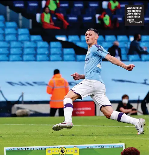  ?? GETTY IMAGES ?? Wonderkid: Foden nets City’s third and shines again