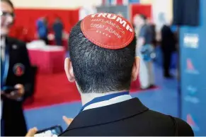  ??  ?? Coming to a head: A man wearing a yarmulke supporting Trump at the Conservati­ve Political Action Conference in Maryland. — Reuters
