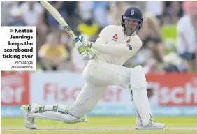  ?? AP/Eranga Jayawarden­a ?? Keaton Jennings keeps the scoreboard ticking over