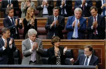  ?? PAUL WHITE/THE ASSOCIATED PRESS ?? Spanish Prime Minister Mariano Rajoy, bottom right, said he rejected offers of mediation in the Catalonia crisis.