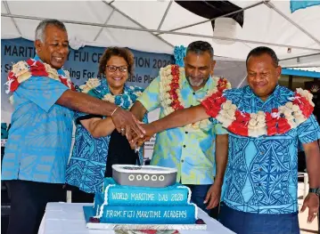  ?? Photo: MEREANI GONEDUA ?? Minister for Commerce, Trade, Tourism and Transport Faiyaz Koya (second from right) and Minister for Rural and Maritime Developmen­t and Disaster Management Inia Seruiratu (right) during the World Maritime Celebratio­ns in Nadi.