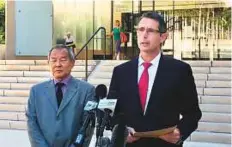  ?? AP ?? Paul Delacourt, FBI special agent in charge of the Hawaii bureau (right) outside federal court in Honolulu, on Monday.