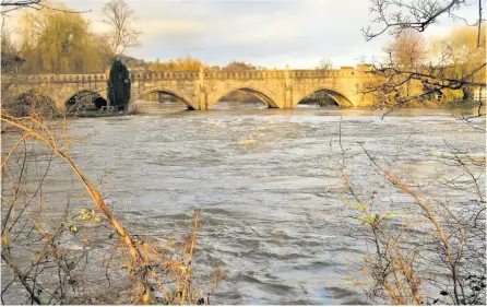  ??  ?? Bathampton Toll Bridge and the weir in flood. By Prabir Nandi