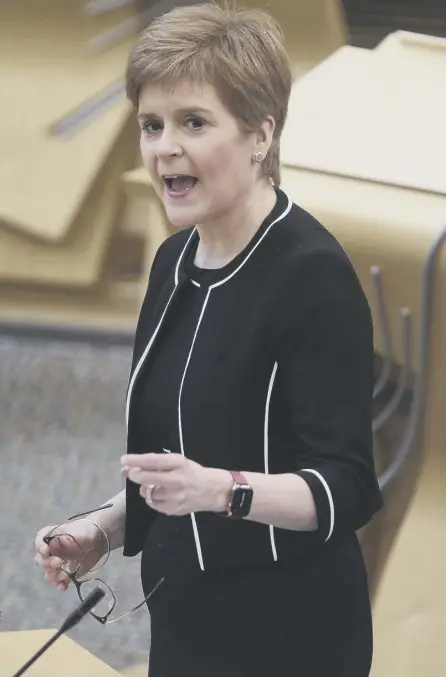  ??  ?? 2 First Minister Nicola Sturgeon is resisting the vote of the Scottish Parliament to provide the evidence to the Salmond Inquiry she originally promised