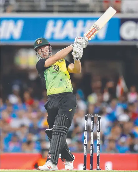  ?? Picture: GETTY IMAGES ?? Australian batsman Chris Lynn tees off in his innings of 37 off 20 balls at the Gabba.