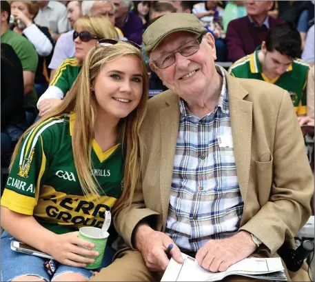  ?? Photo by Michelle Cooper Galvin ?? Tadhg O’Donoghue with his granddaugh­ter Cliodhna Guiney, from Valentia, at the Munster Football Finals in Fitzgerald Stadium, Killarney on Sunday