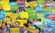  ?? AP ?? Members of the Korea Freedom Federation shout slogans during a rally in Seoul to denounce North Korea's nuclear test.