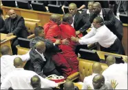  ?? PHOTO: ESA ALEXANDER ?? POLITICAL PAWNS: Police eject EFF MPs from the National Assembly last Thursday night