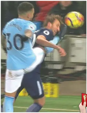  ??  ?? Stretching: Otamendi catches Kane’s head with a high boot