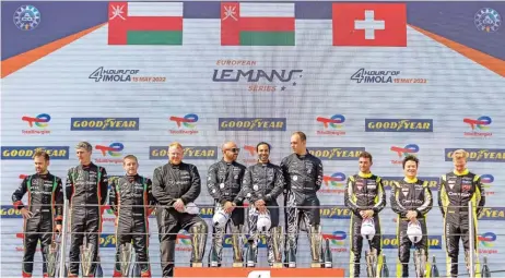  ?? ?? A beaming Ahmad al Harthy (C) is swelling with pride as he stands at the top of the podium in Imola on Sunday