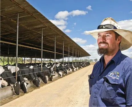  ?? Photo: Nev Madsen ?? NO CRYING: Southbrook dairy farmer Peter Garratt has backed Woolworths moving to stop selling $1-a-litre milk.