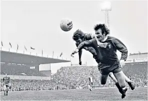  ??  ?? Tommy Smith for Liverpool against Birmingham City at St Andrew’s on March 13 1976. Below, his Mexican bandit moustache suited his air of ruthlessne­ss, and the Liverpool manager Bill Shankly remarked that Smith was ‘not born but quarried’