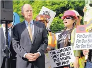  ?? RICH PEDRONCELL­I/ASSOCIATED PRESS ?? California Gov. Jerry Brown waits to speak at a rally to urge lawmakers to approve a tax and fee road repair measure during a rally Wednesday in Sacramento, Calif.