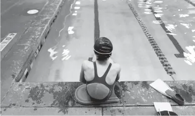  ?? RICK BOWMER/AP ?? A proposed ban on transgende­r athletes playing girls school sports in Utah would affect transgende­r girls like this 12-year-old swimmer. She cried when she heard about the legislativ­e proposal, which would separate her from her friends.