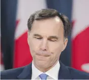  ?? SEAN KILPATRICK / THE CANADIAN PRESS ?? Minister of Finance Bill Morneau’s proposed boundaries on the use of private corporatio­ns for “tax planning” is developing into a political hot potato, columnist Andrew Coyne writes.