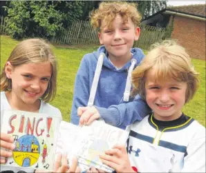  ?? FM3865032 ?? Chloe Sands, 9, Jacob Strouts, 10, and Isaac Watson-Howland, 7, with the fund-raising CDs