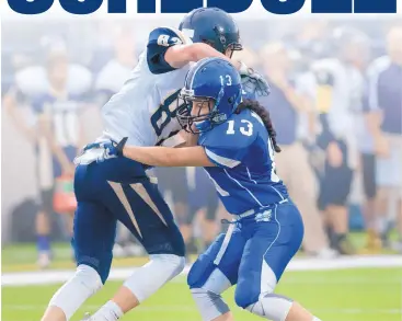  ?? EDDIE MOORE/JOURNAL ?? St. Michael’s and Santa Fe High renew their football rivalry tonight at Ivan Head Stadium. From last year’s season opener, St. Michael’s Jocelyn Fernandez, right, is shown blocking Santa Fe High’s Zach Russell.