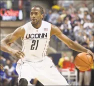  ?? Thomas Cain / Associated Press ?? UConn’s Stanley Robinson handles the ball against Seton Hall on Jan. 6, 2010.