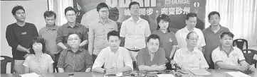  ??  ?? Chong (seated third right) speaking during the press conference while flanked by DAP Sarawak committee members. Seated at right is Dr Ting.