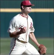  ?? NWA Democrat-Gazette/J.T. WAMPLER ?? pumps his fist as the Razorbacks finish off Alabama 9-7 on Sunday at Baum Stadium in Fayettevil­le. Seven of eight Arkansas pitchers combined to issue a school-record 15 walks in a game that lasted 4 hours and 27 minutes.