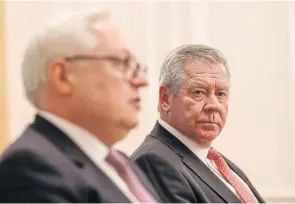  ?? BLOOMBERG ?? Gennady Gatilov, Russia’s deputy foreign minister, right, looks at Sergei Ryabkov, Russia’s deputy foreign minister, during a news conference in Geneva, Switzerlan­d on Monday.