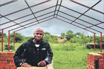  ??  ?? Feeling helpless: Mmotoaneng community member David Aphane’s piggery was vandalised by land invaders