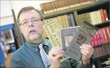  ?? Kirk McKoy Los Angeles Times ?? PETER BLODGETT, editor of “Motoring West: Automobile Pioneers, 1900-1909,” explored publicatio­ns such as Scientific American, Outing and Munsey’s Magazine to find the stories of the first West Coast road trips.