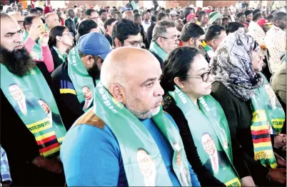  ?? Picture by Memory Mangombe ?? Members of the Asian community follow proceeding­s during a meeting with Vice President Constantin­o Chiwenga in Belvedere, Harare, yesterday. —