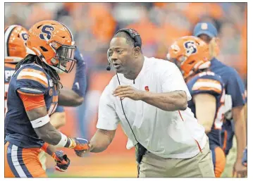  ?? [PHOTOS BY NICK LISI/THE ASSOCIATED PRESS] ?? “I don’t think there’s a game in the ACC we’ve been out of, and I’m proud of that part,” Syracuse head coach Babers said. “I don’t think the guys have quit.”